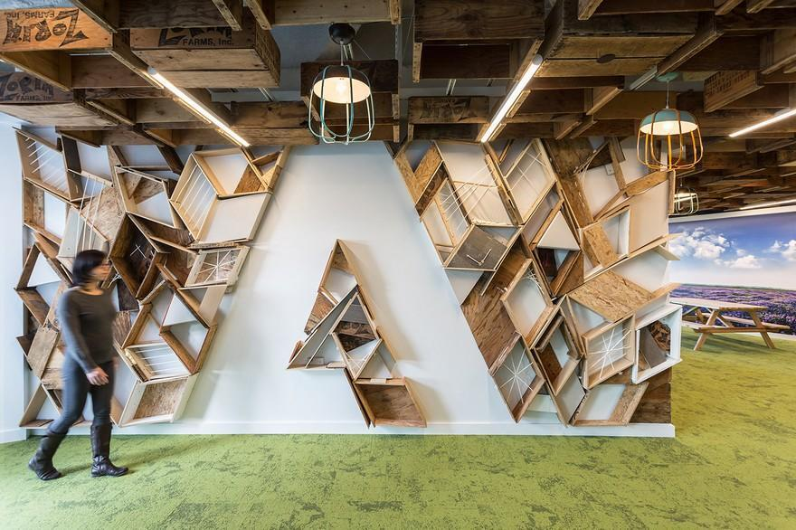 Wood decor on an empty white wall show the letter A in Adobe's HQ in San Jose