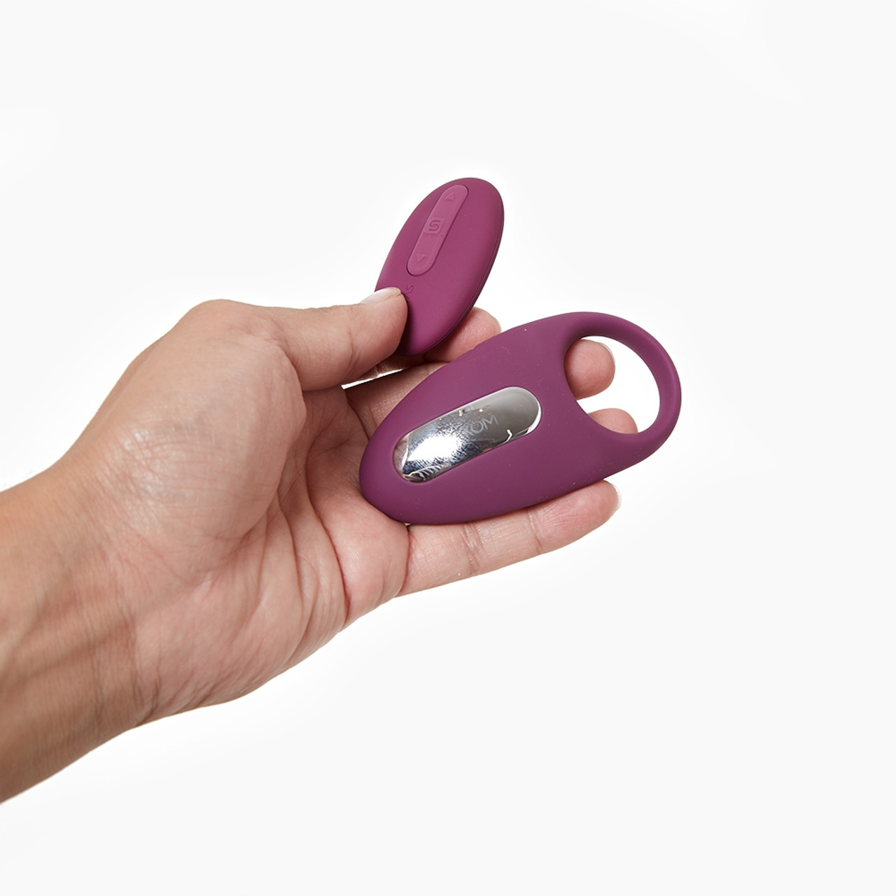Svakom Winni vibrating cock ring with remote held in hand