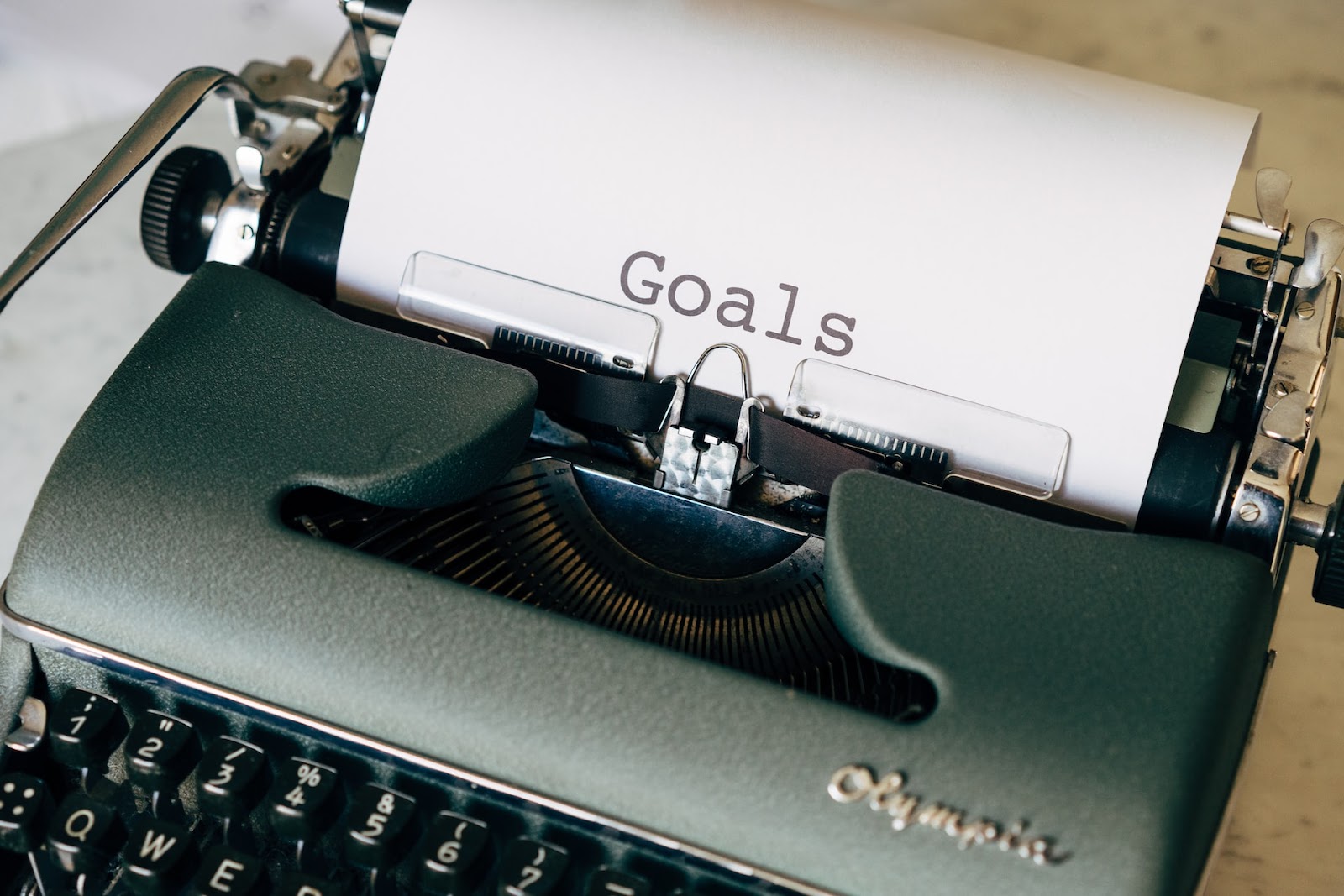 the word "Goals" typed on a typewriter