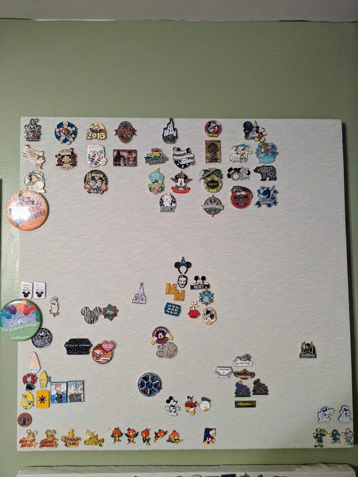 Our disney pin trading board that commemorates our trips!