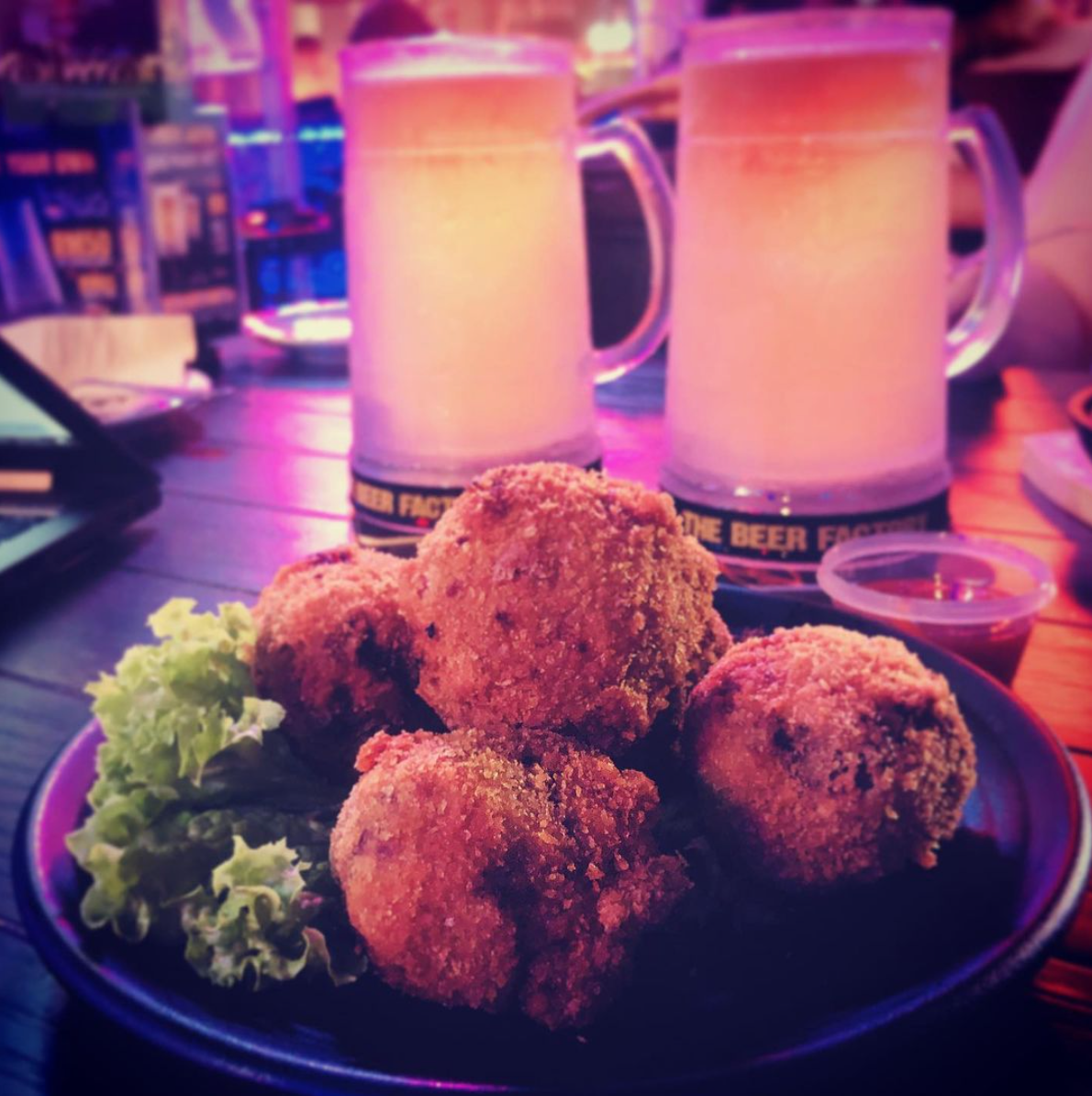 Spicy mutton balls and two pints of beer