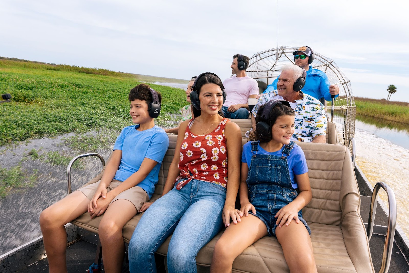 Adults and children go for an airboat tour at Wild Florida