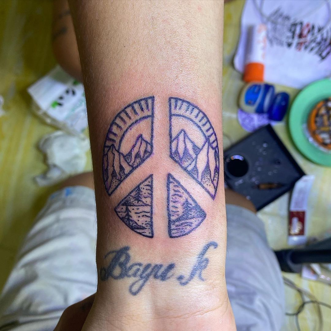 Peace With Mountain Background Tattoo