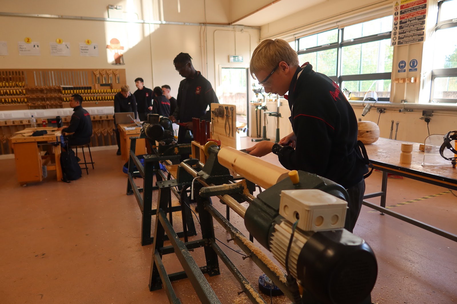 Piper Hill College students in the woodwork room using the machines 