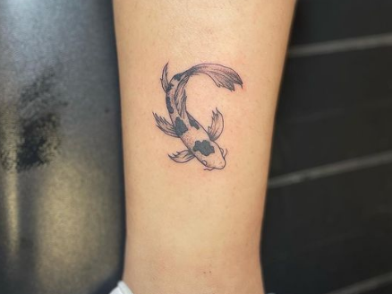 stylish koi fish tattoo