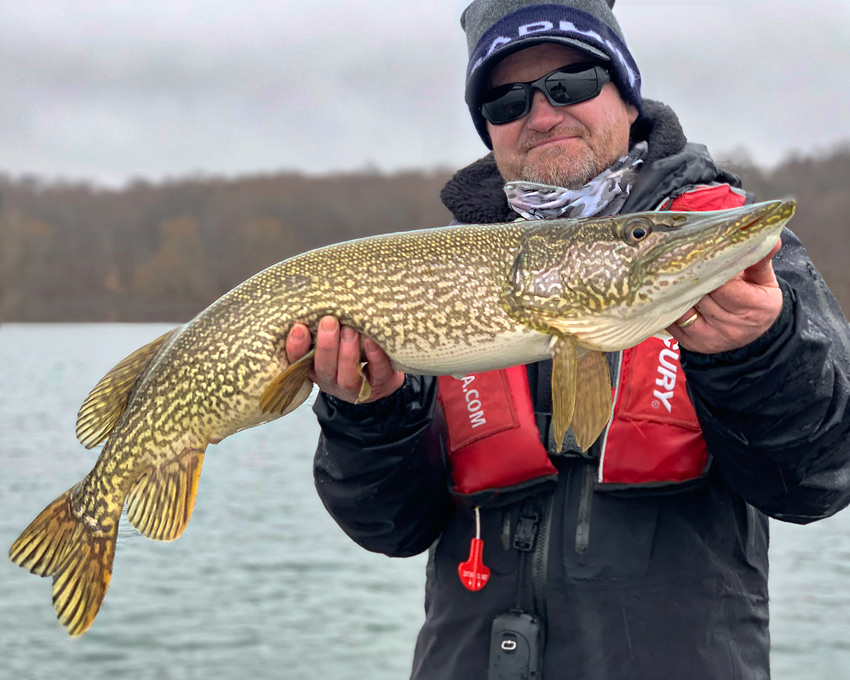 Pete Bowman holding a Lake Ontario Northern Pike