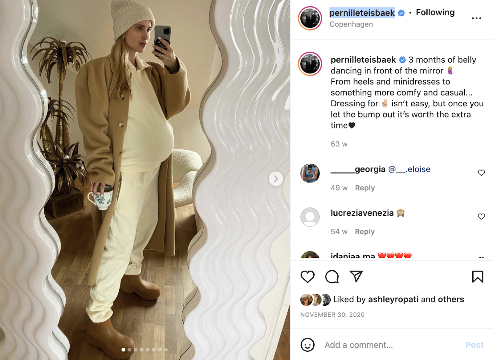 Pernille Teisbaek in tan boots, a cream sweatsuit set, a camel-coloured coat and a chunky cream beanie