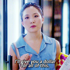 GIF of a woman in a store saying: "I'l give you a dollar for all of this"