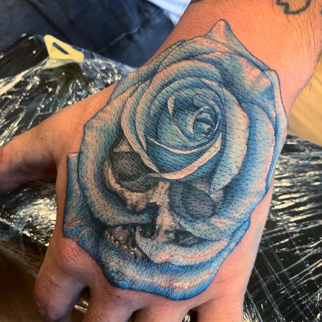 hand rose tattoo