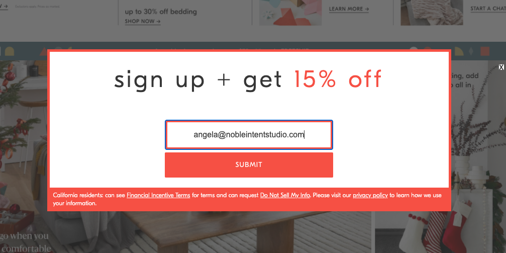 pop up says "sign up and get 15% off" with submit button