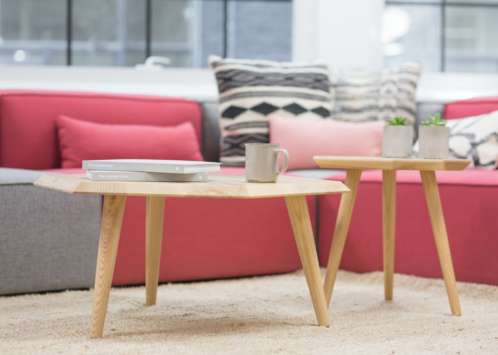 modern meeting space with tables and cushions