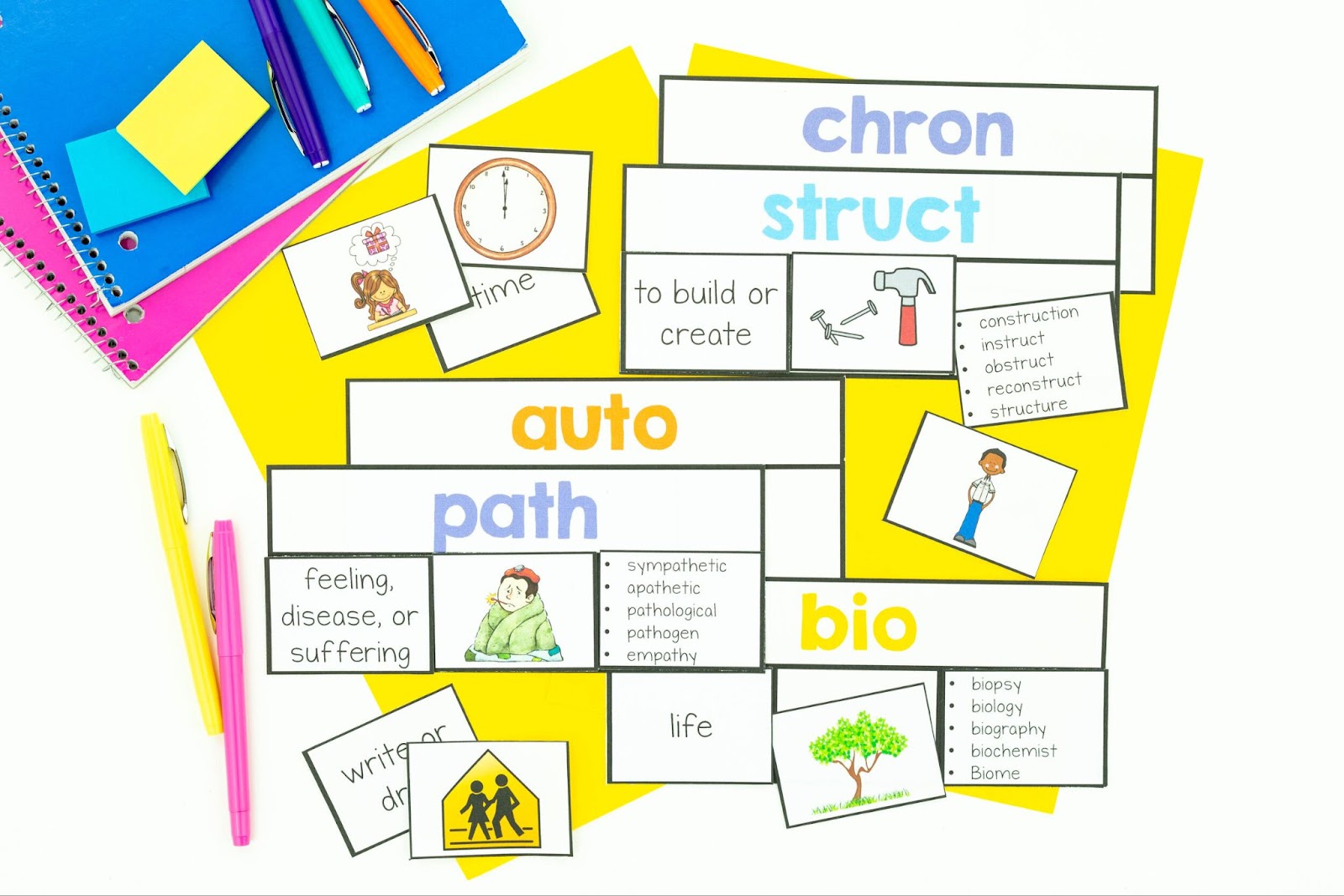 Root word wall with colorful root word examples