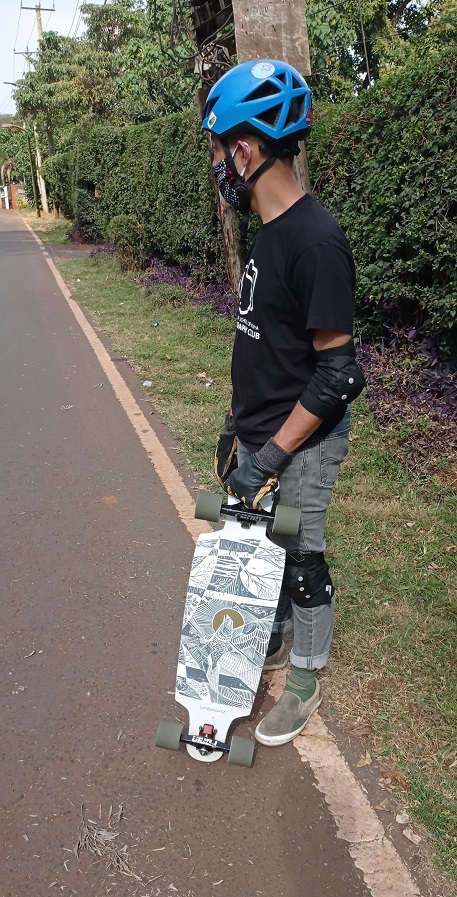 old longboarder with landyachtz drop cat 33