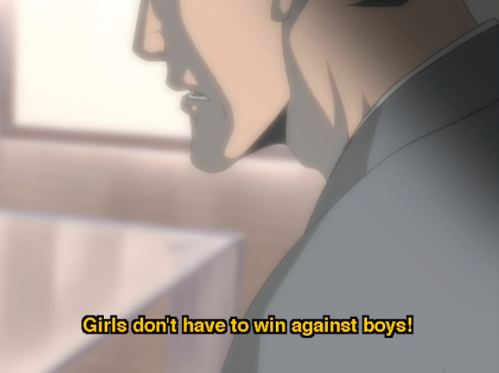 A close-up on a man's lower face as he says "Girls don't have to win against boys!"