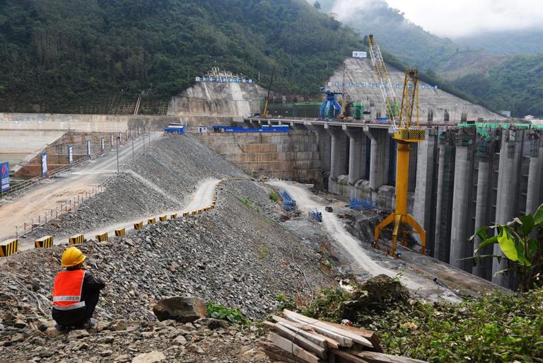 Workers on a dam construction site in Luang Prabang, Laos, in 2019. File photo: Shutterstock