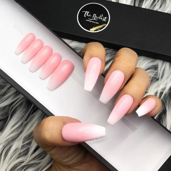 Lady shows off her ombre nails and a pair of ombre pink and white nails too