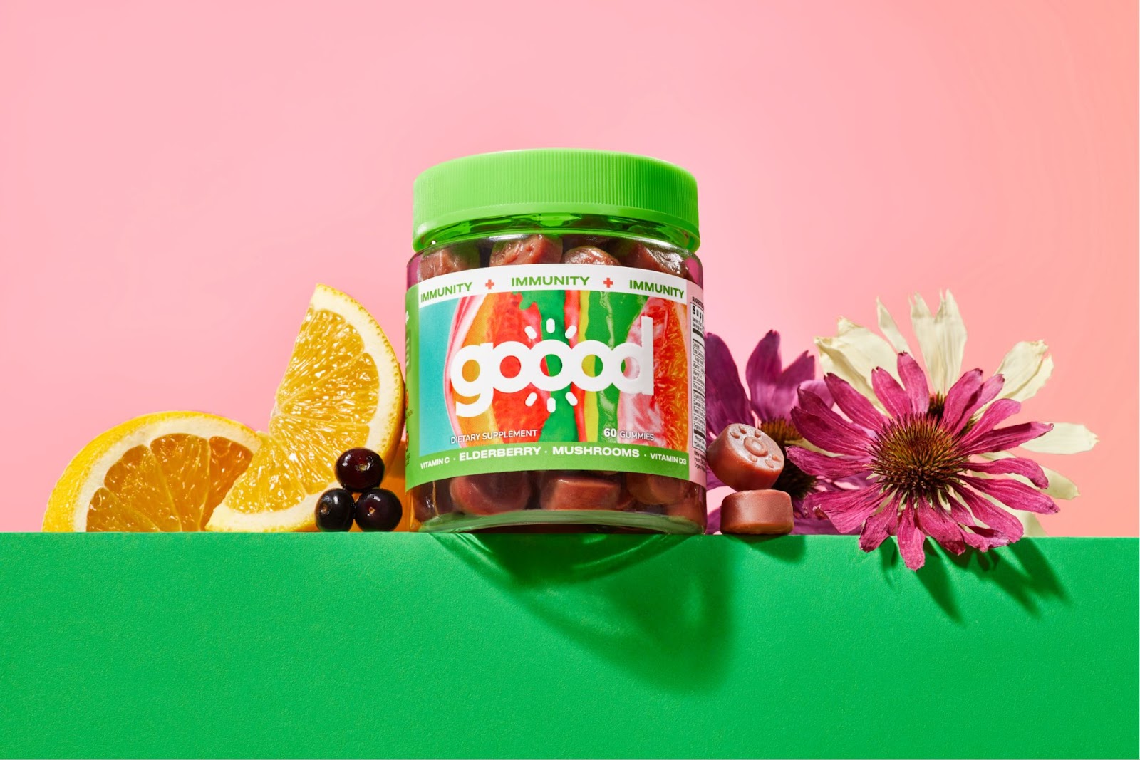 Packaging design for Goood Wellness featuring real flowers, fruits and botanicals dripping with color 