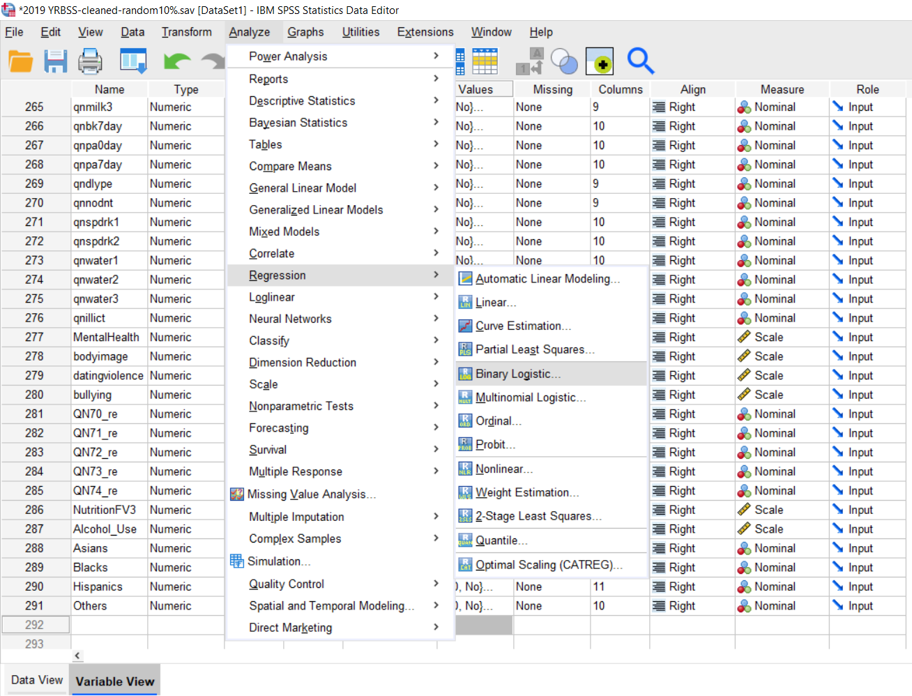 Screenshot from SPSS software, with Analyze menu open and Binary Logistic option selected.