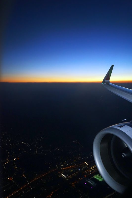 night time view from a plane, looking at the horizon