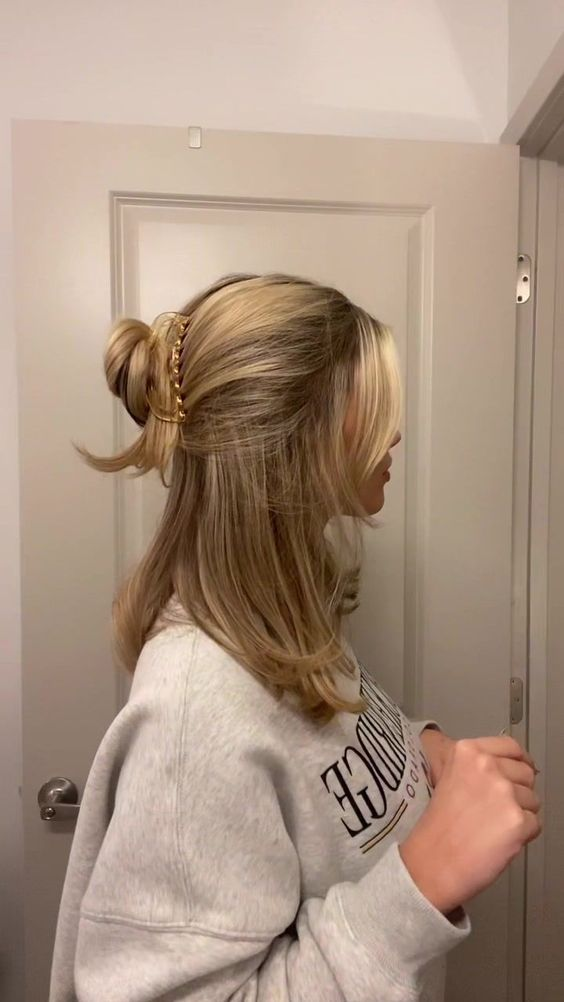 half-up half-down messy bun 