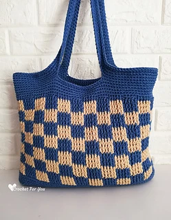 checkerboard tote bag with white brick background
