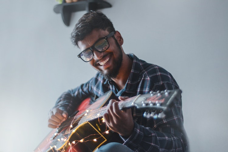 Musician playing guitar