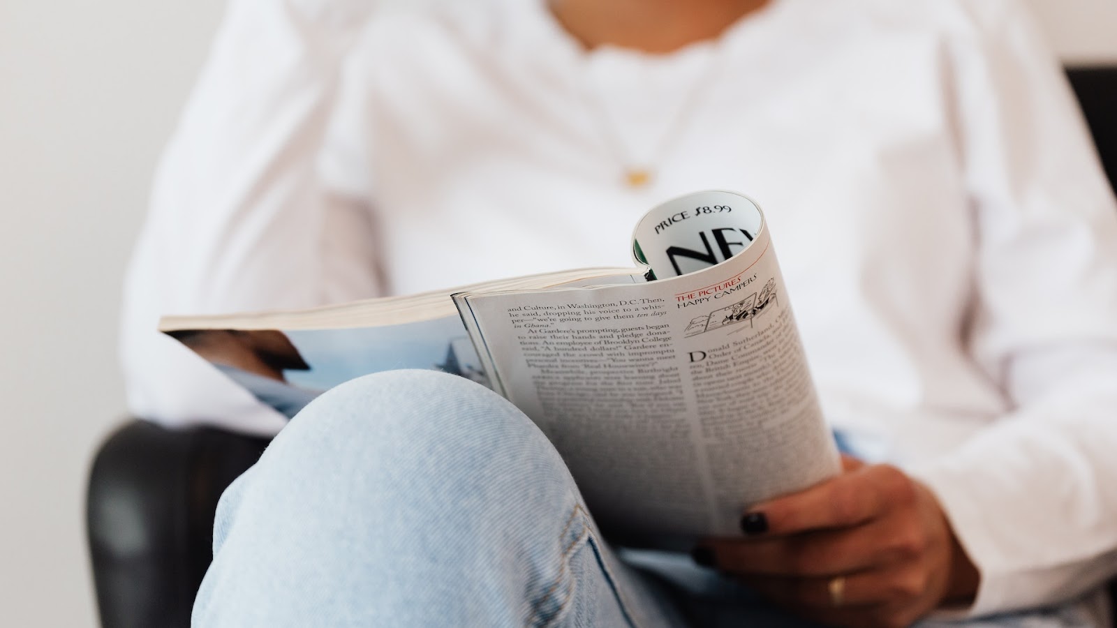 Research paper 2: a woman is reading a journal