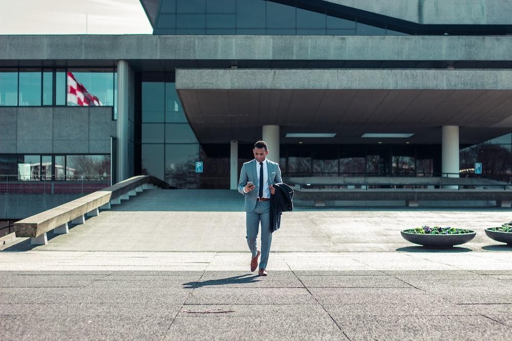 A happy man leaving the office