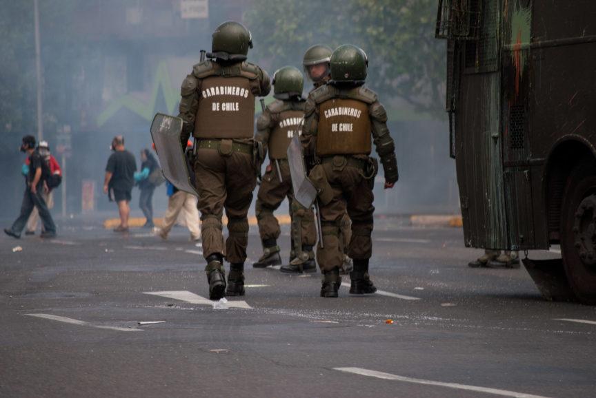 Riot police at a protest in Chile