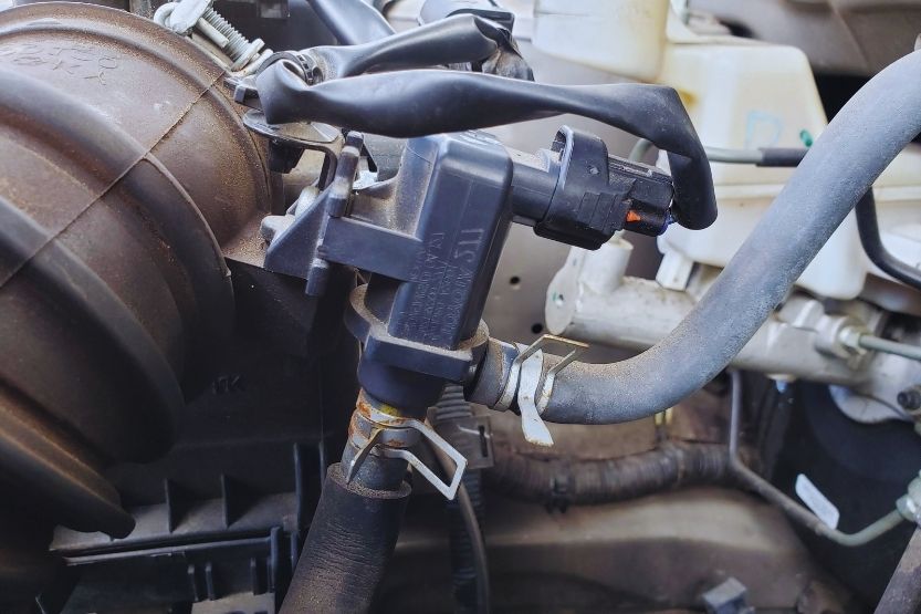 Your purge valve prevents fuel vapors in your car's gas container from leaking into the environment and the car's cabin. It also guarantees that your intake vacuum carries the appropriate amount of gasoline vapors required by your engine inlet manifold.