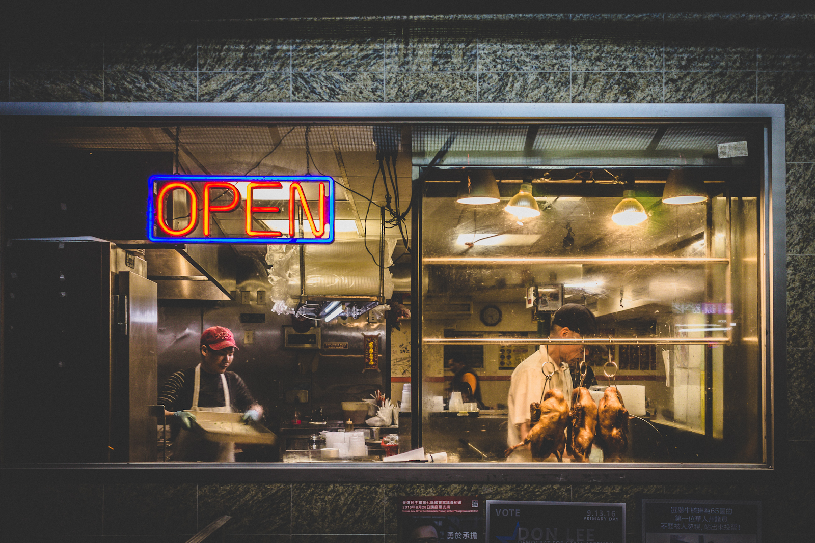 Family-owned business with an "open" sign in the window