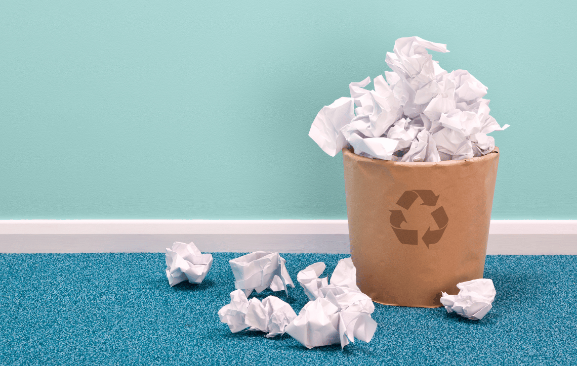 Paper in recycling bin