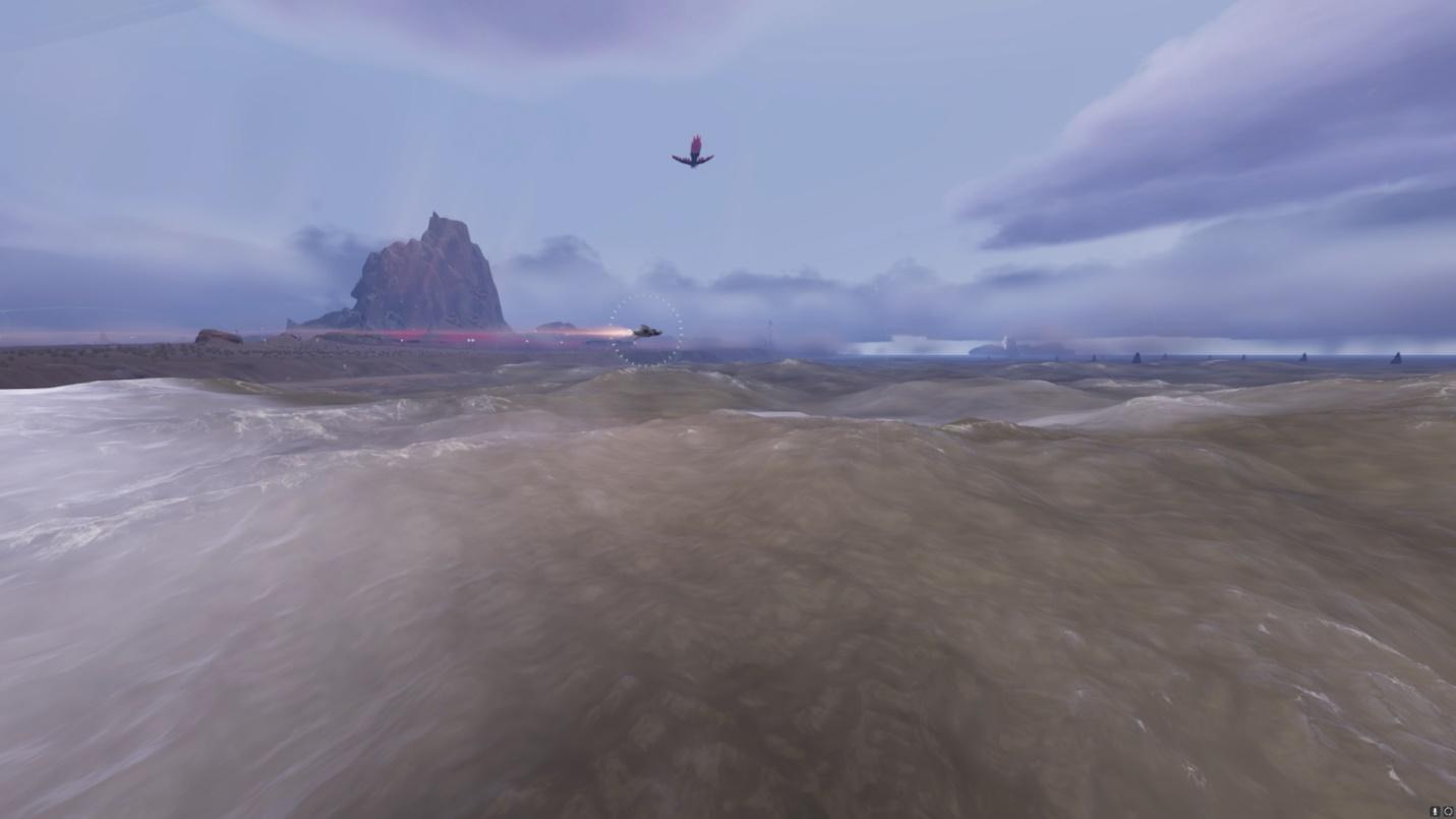 A helicopter flying over a sandy beach Description automatically generated with medium confidence