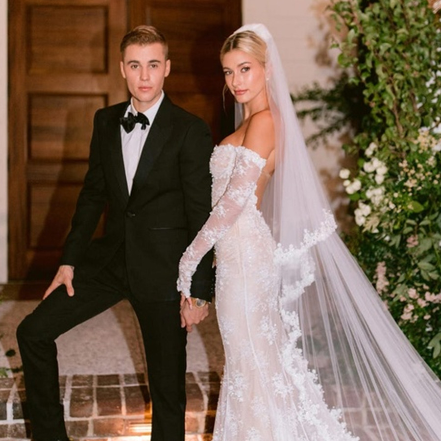 Couple holding hands at the wedding