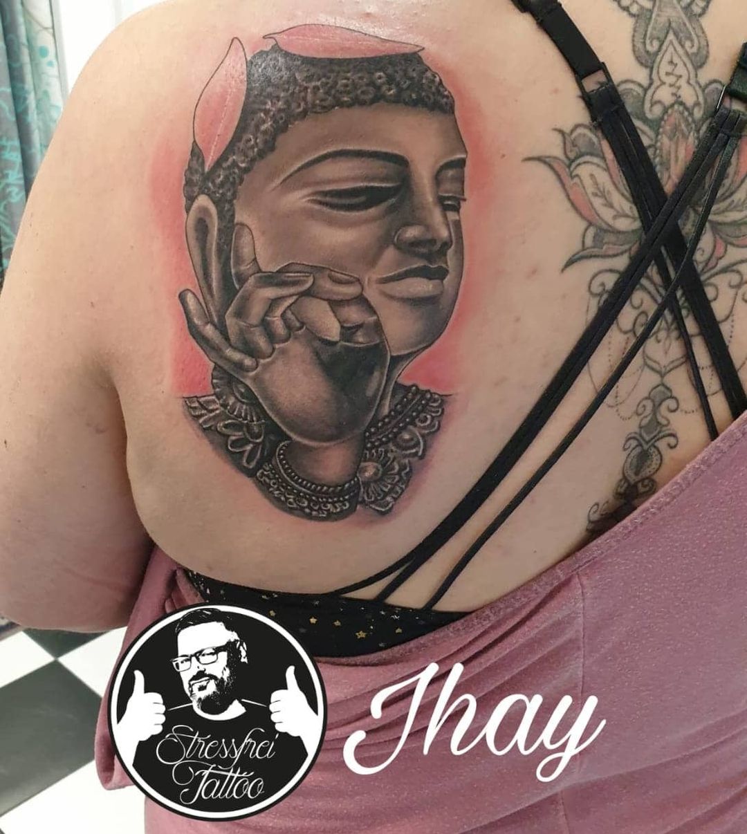 Amusing Buddha with Lotus Tattoo 