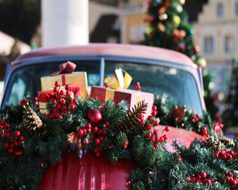 green and red wreath on the red car