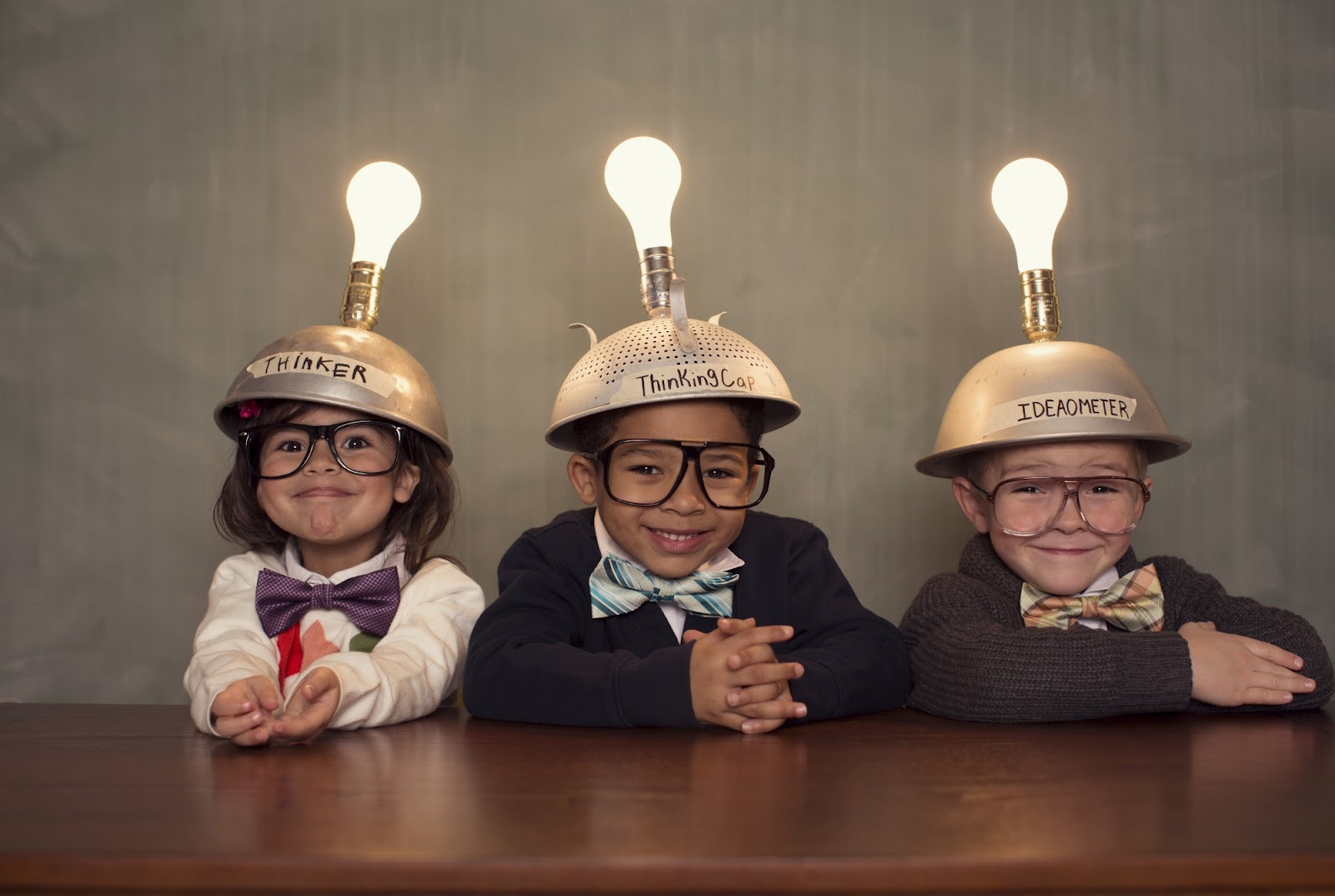 three kids light bulbs.jpg