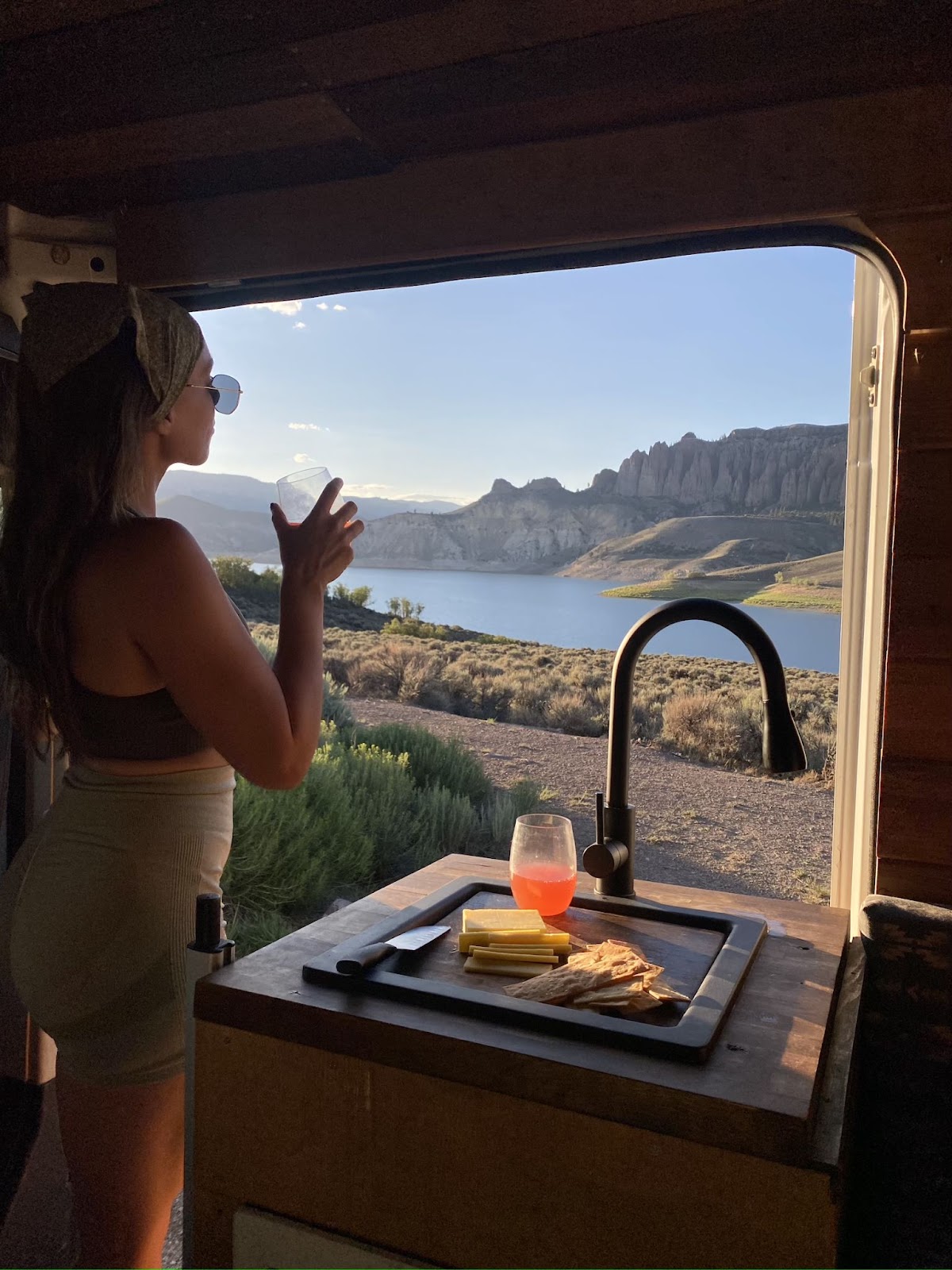 Campervan window view with mountains