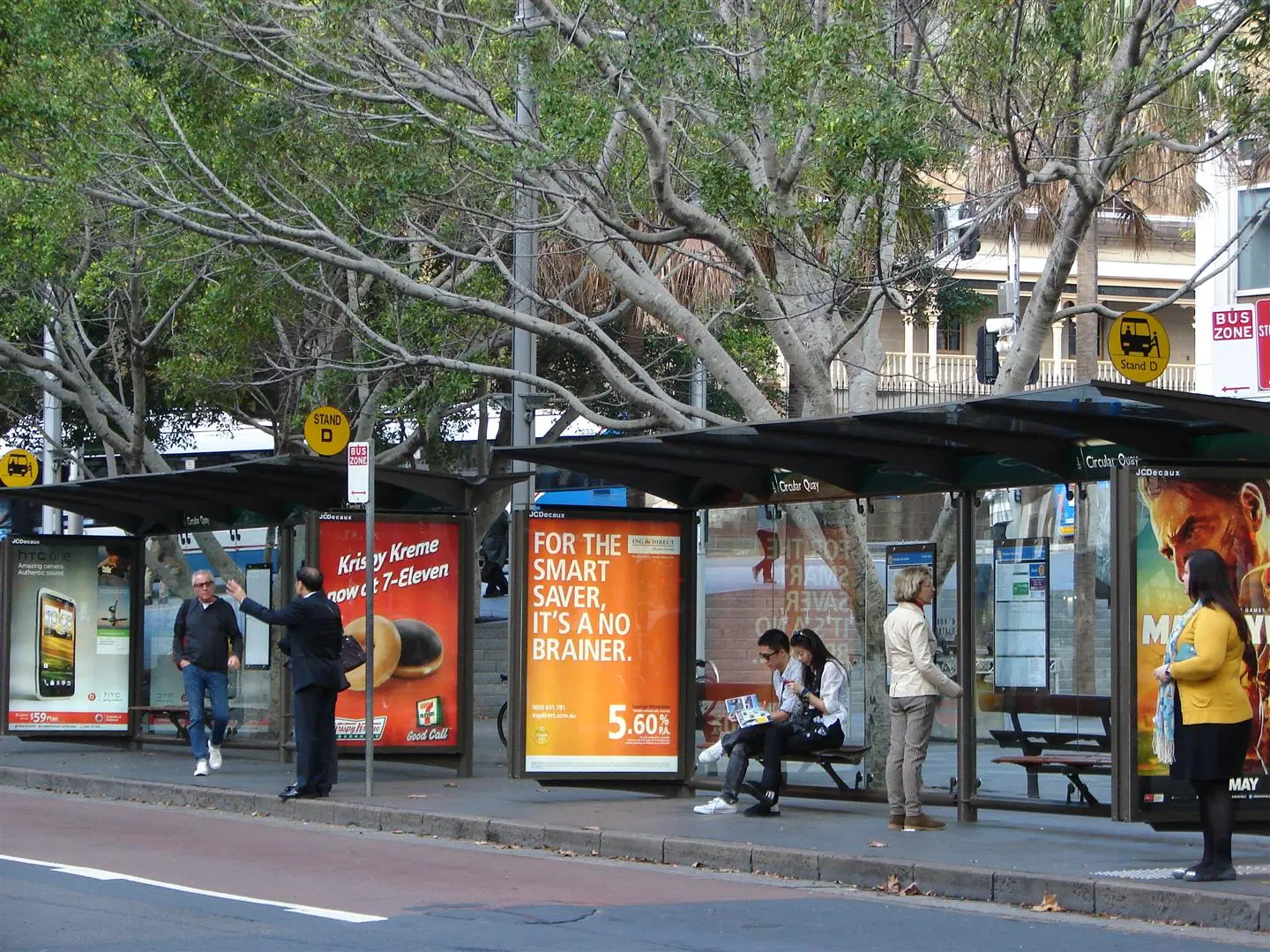 Example of a sheltered bus stop with seating, can accommodate many waiting riders comfortably.