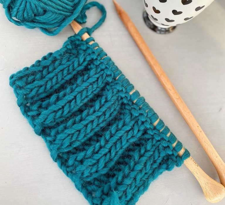 teal knitting