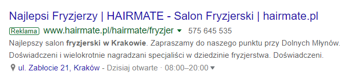  Opis: Przykład reklamy z rozszerzeniami lokalizacji z wyszukiwarki Google.