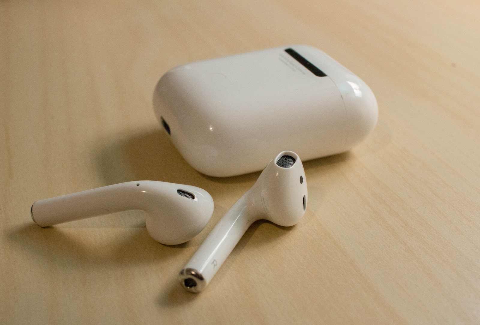 This image shows the Apple AirPods 3rd Generation on the table.