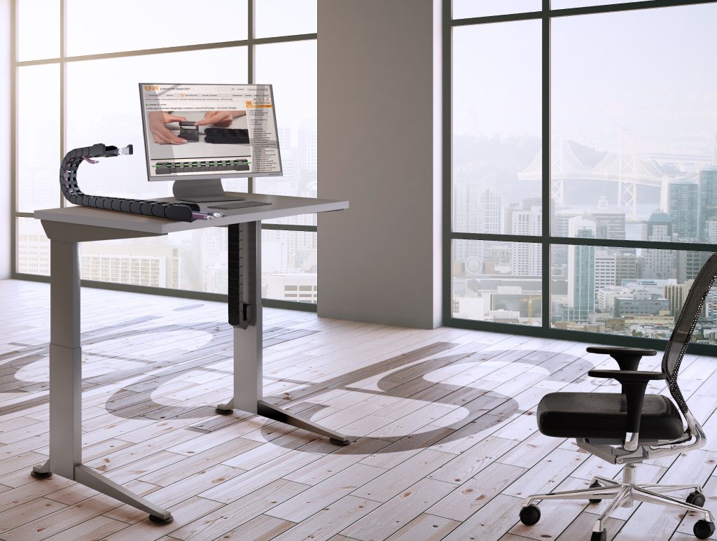 Concept image of a desk with installed cable carriers