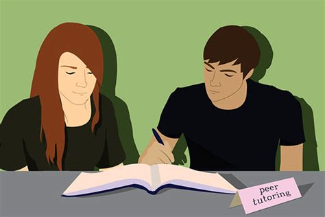 Un estudiante masculino y femenino sentados uno al lado del otro estudiando.