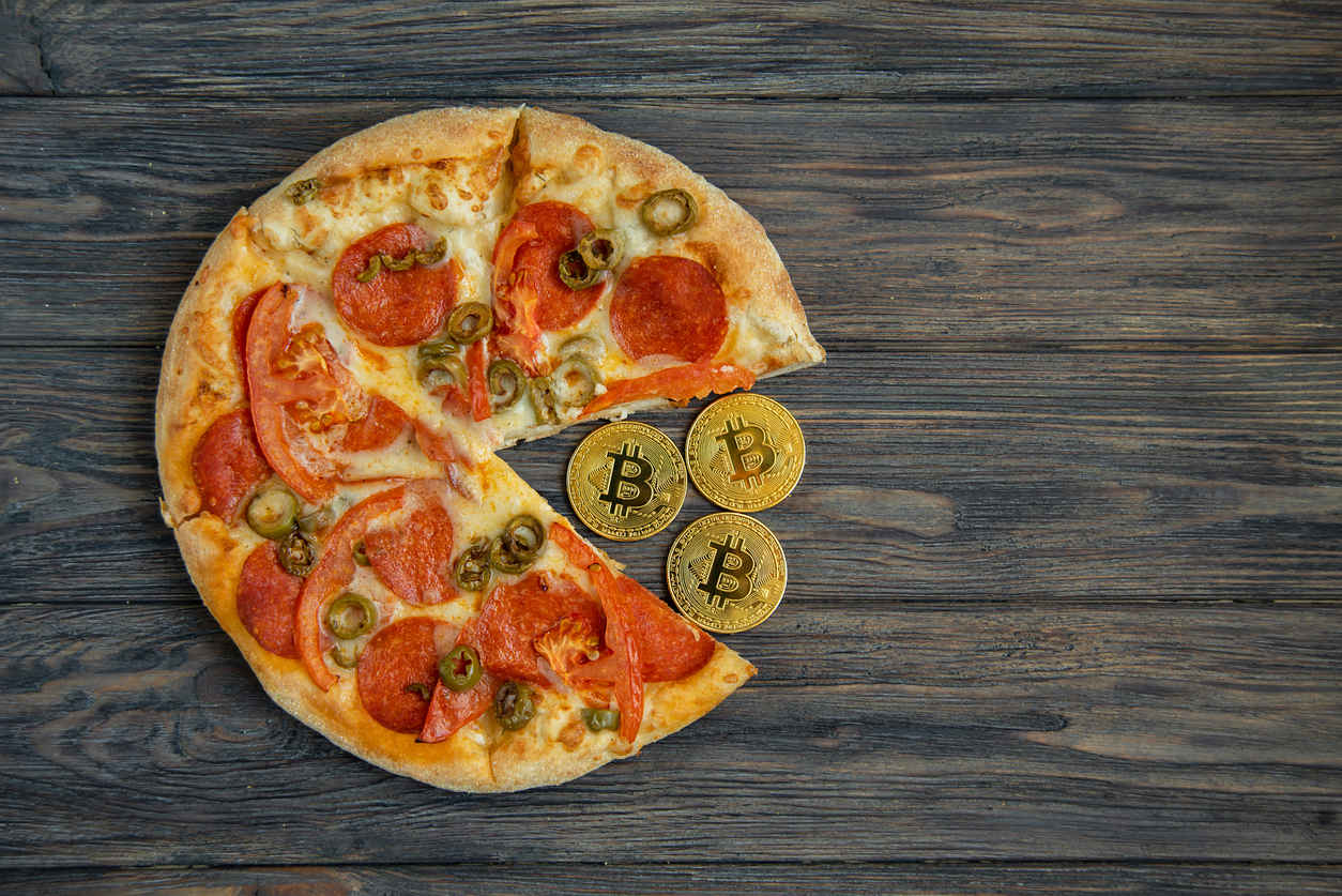 A pizza that has Bitcoins instead of a pizza slice