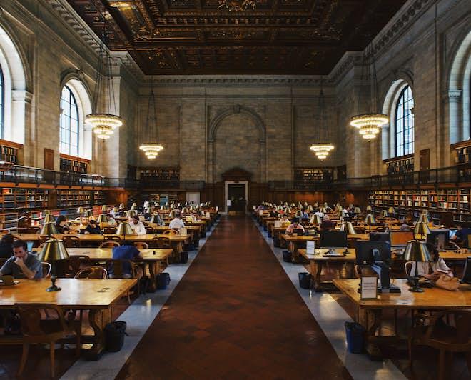 People studying inside the Mid-Manhattan Library in New York