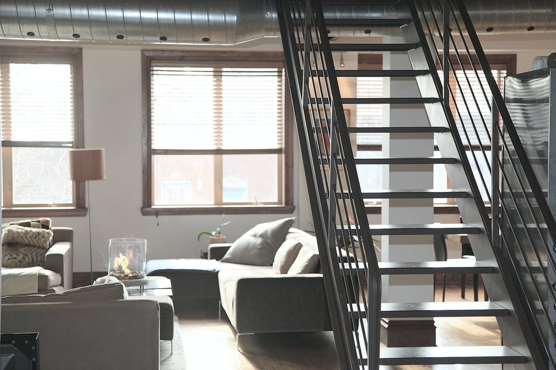 Gray Couch Beside Window