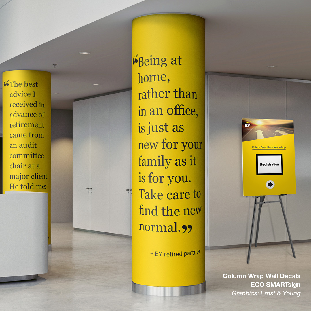 Large column wrap decals that show quotes from retired Ernst & Young partners.  In the background a yellow sign with similar branding to the columns directs guests to the registration table.