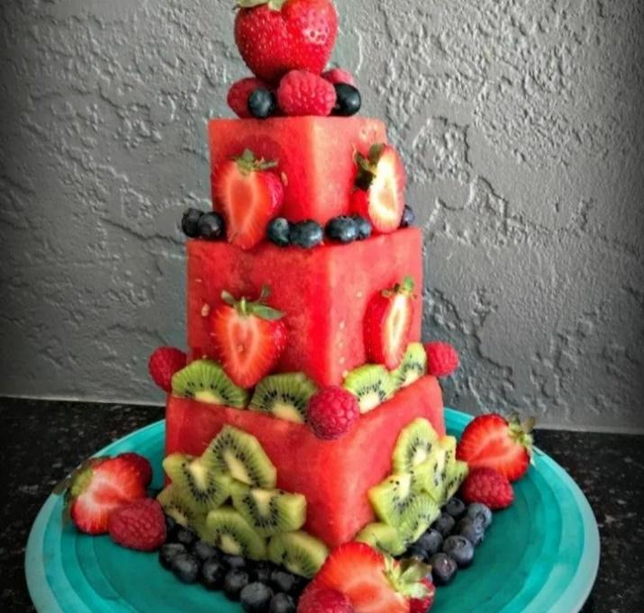 A cake with fruit on top

Description automatically generated with low confidence