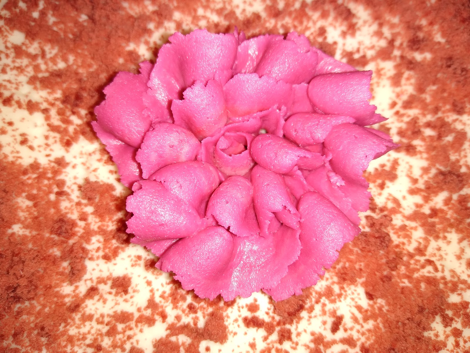 ruffled buttercream frosting flower picture